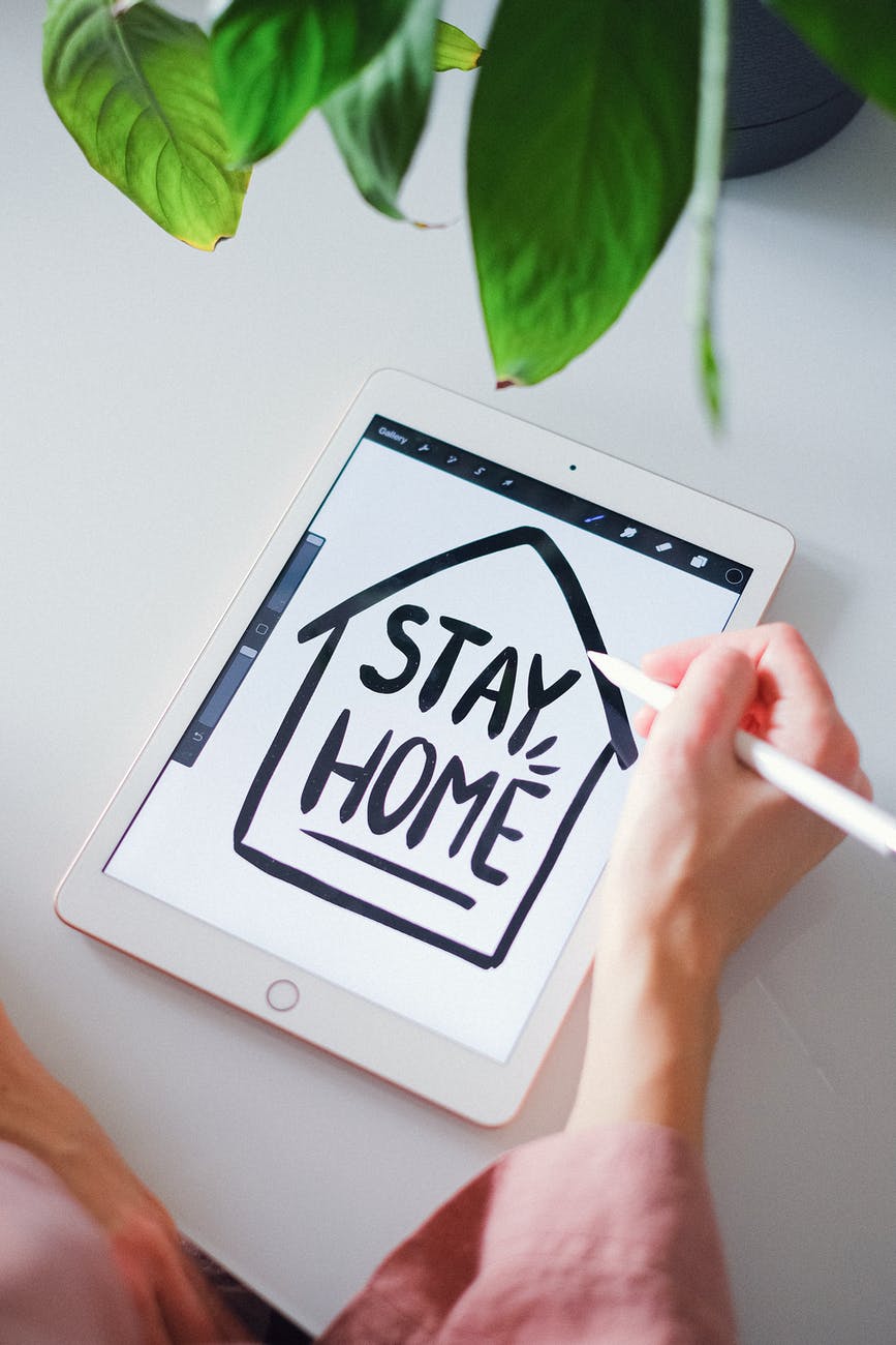 white ipad on white table